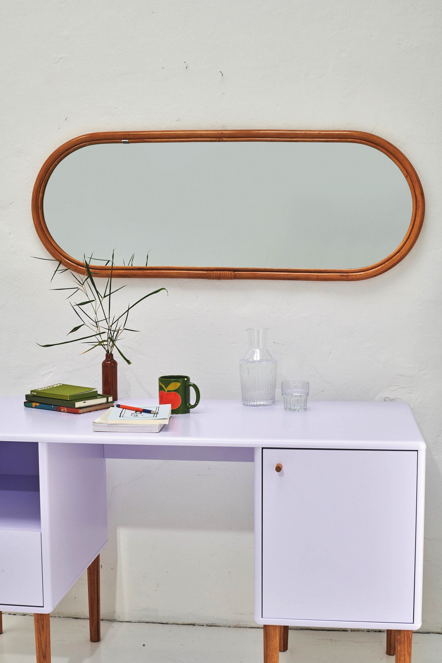 Spiegel TOM TAILOR   oval mit Rattanrahmen mit TOM TAILOR Metallring am Rahmen